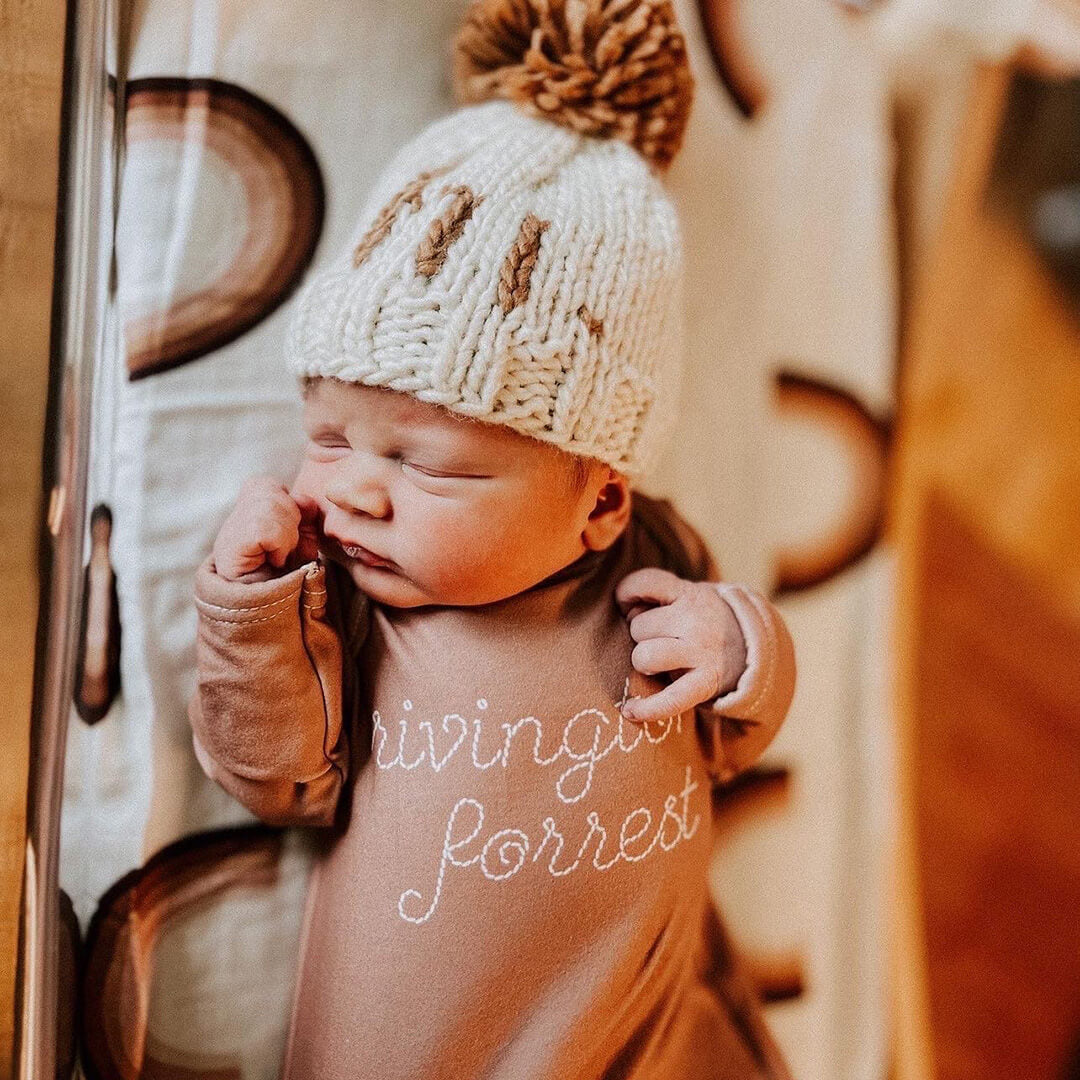 newborn knot gown stitched name neutral tones 