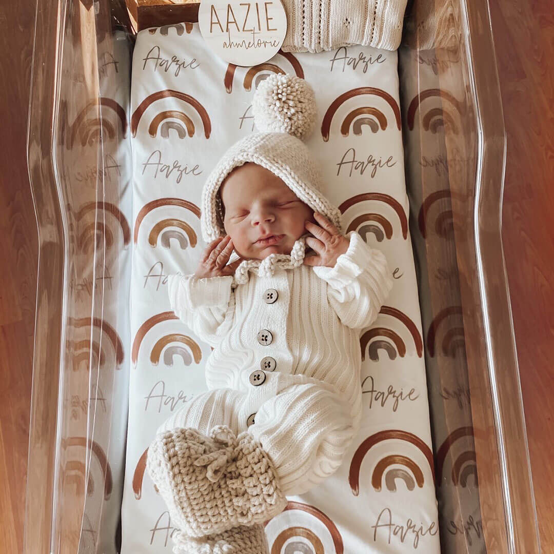 cannon's earthy rainbow swaddle blanket personalized for baby 