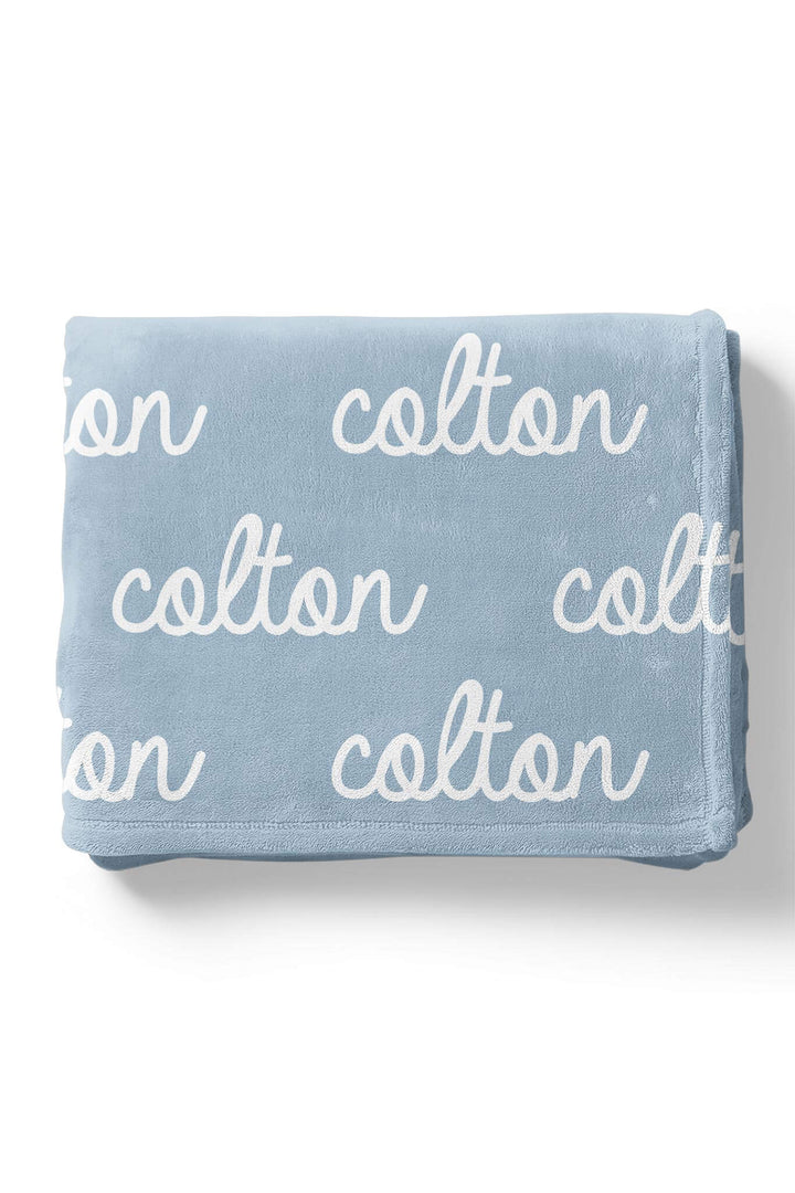sky blue personalized name blanket in script font