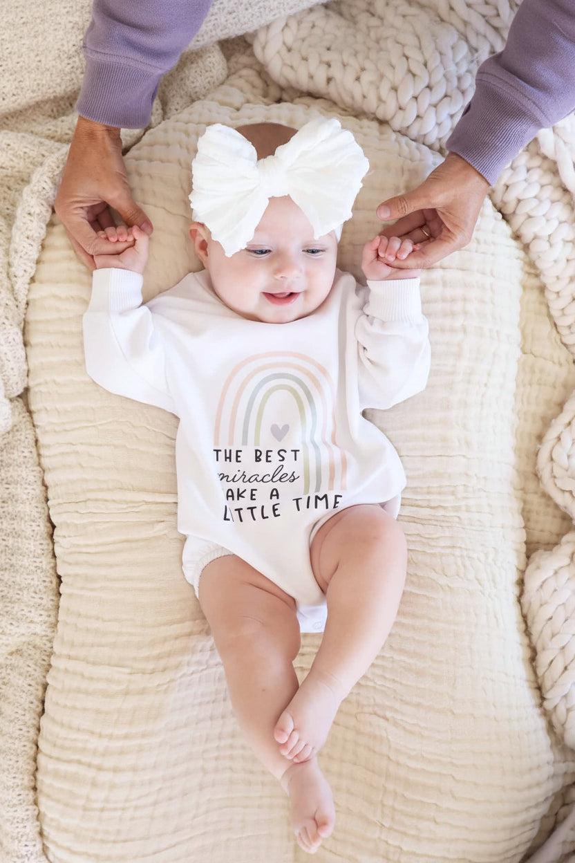 rainbow miracles take a little time sweatshirt bubble romper