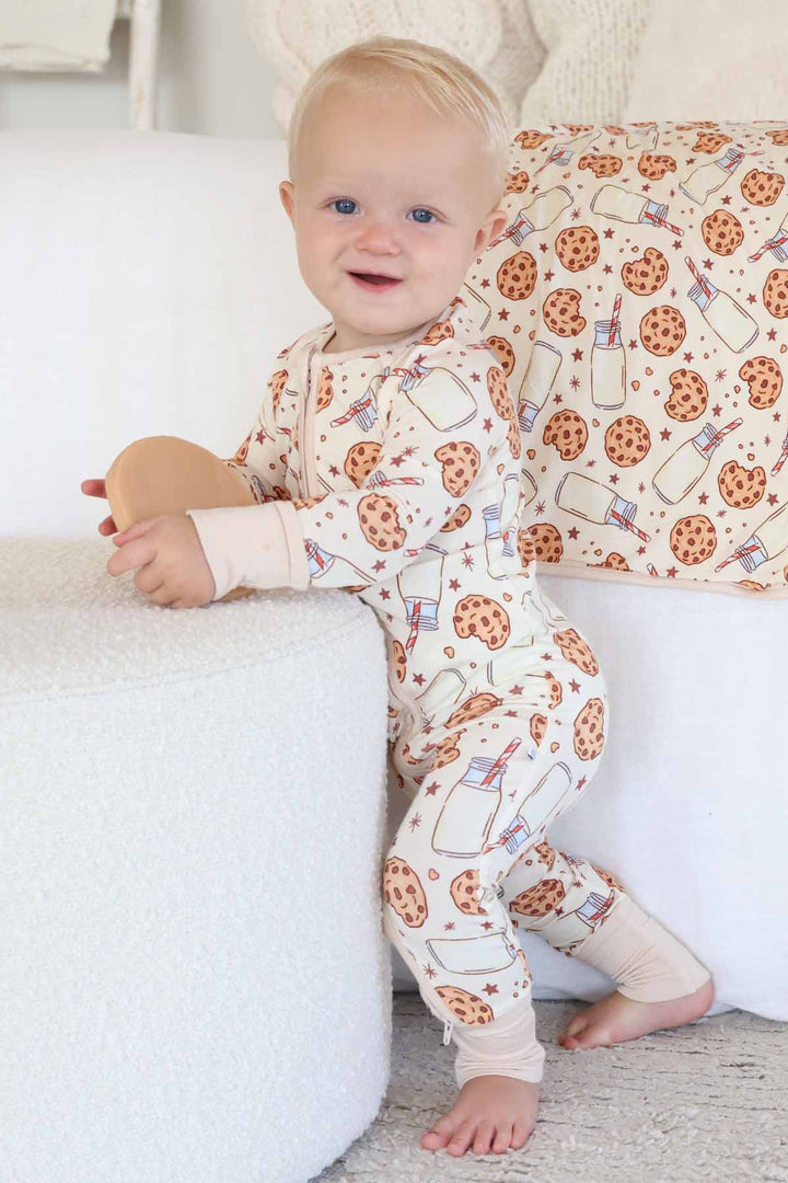 Baby wearing Cookie Cuddles Convertible Zip Romper while standing