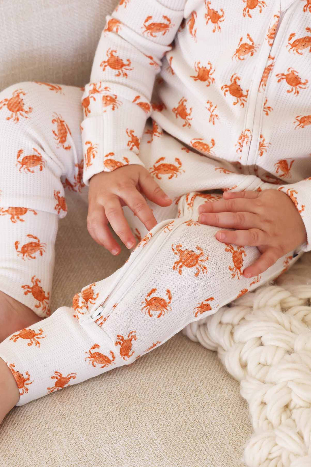 crab convertible pajama romper orange and off white 