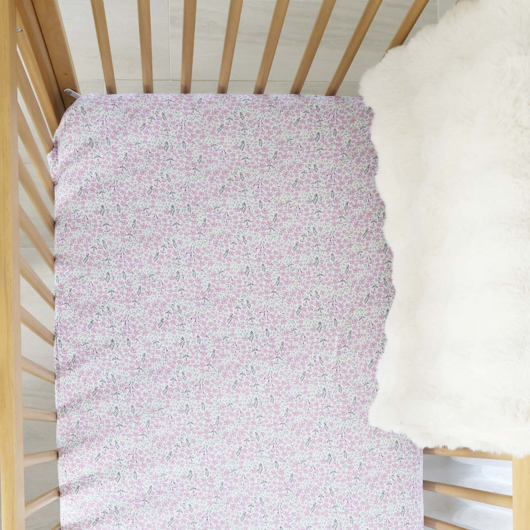 dainty purple floral crib sheet for baby girls 
