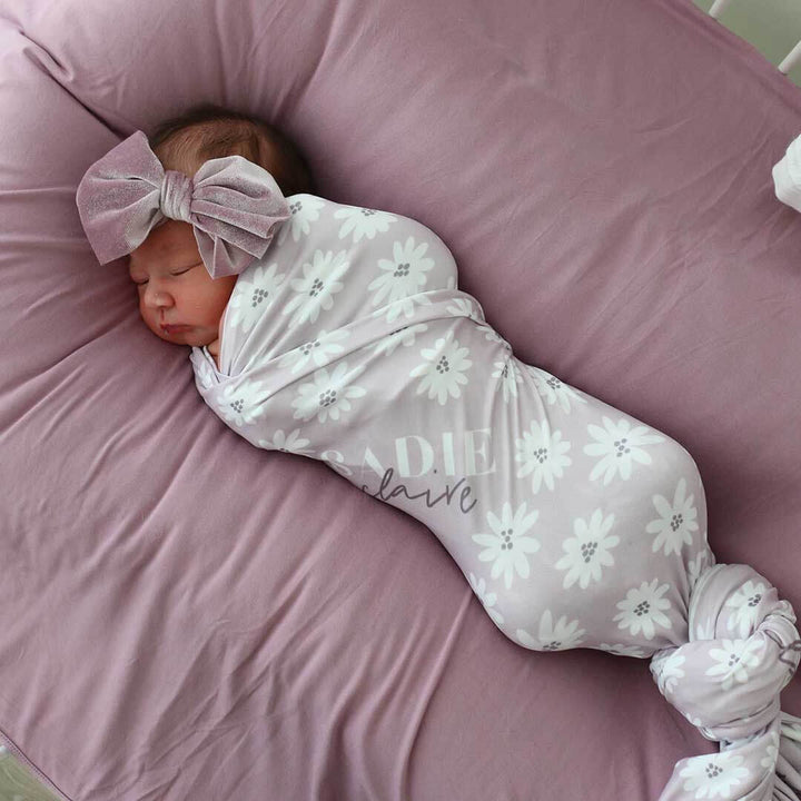 personalized swaddle blanket with daisies purple 