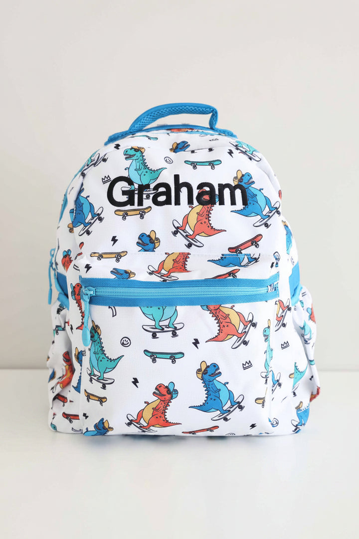 skateboarding dinosaur backpack for boys 