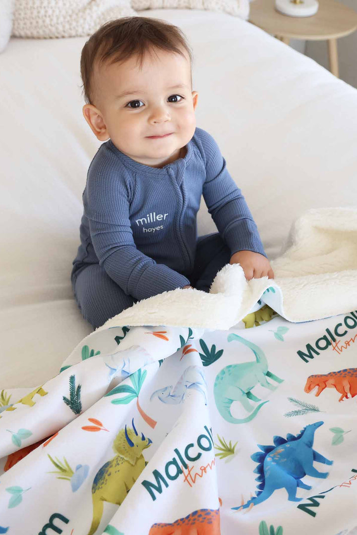 blue, orange and green personalized dinosaur sherpa blanket for kids 