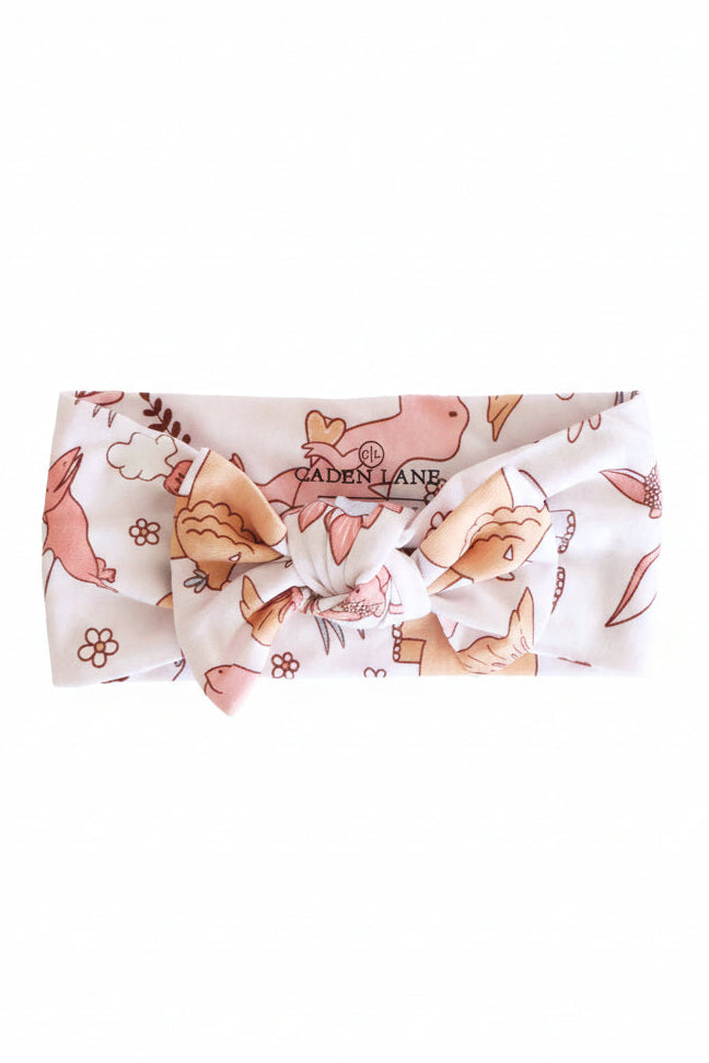 pink dinosaur headwrap for babies 