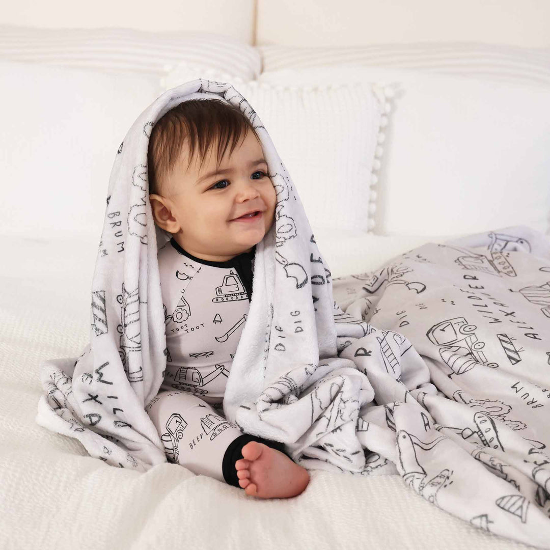 personalized kids blanket with construction truck and bulldozer doodle print for toddlers
