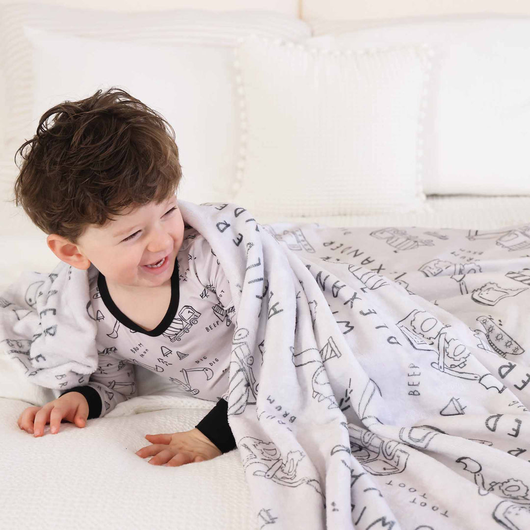 personalized kids blanket with trucks and dozers doodle print for boys