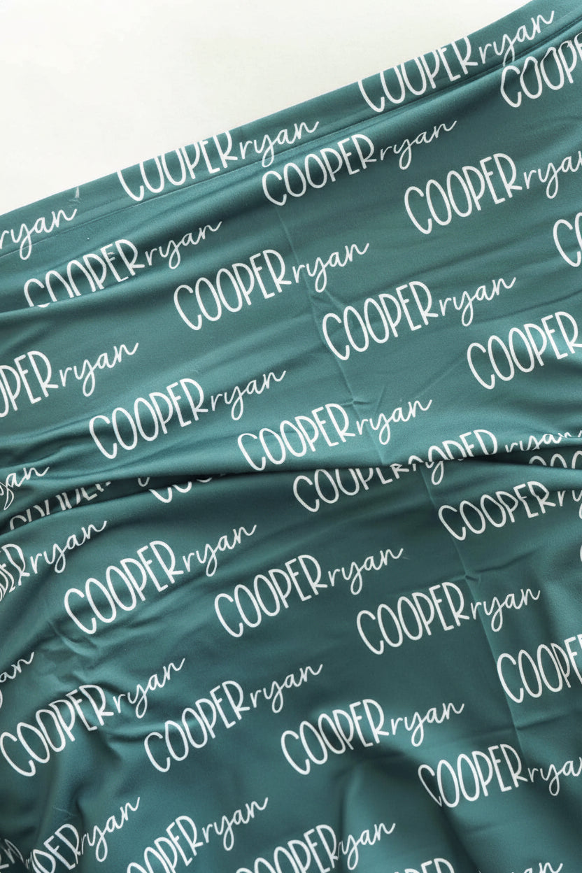 emerald personalized baby name swaddle blanket