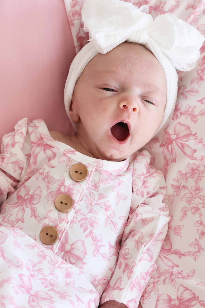 fancy frills pink and white long sleeve newborn baby knot gown 