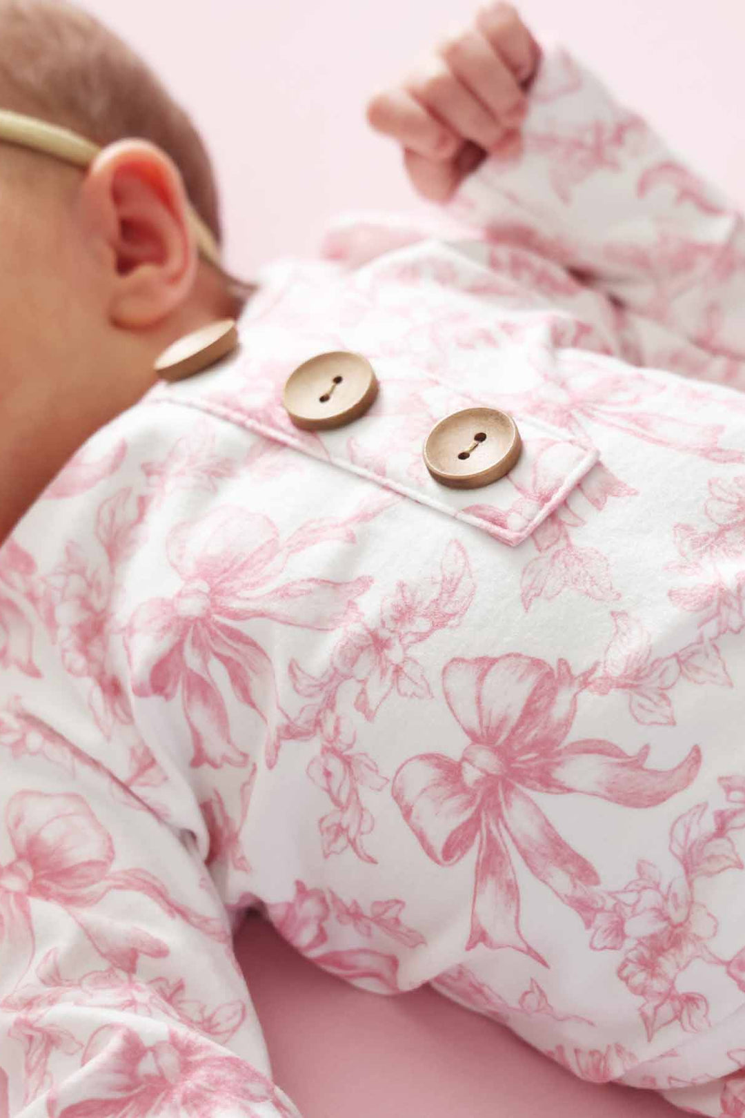 pink and white bow and floral bamboo knot gown for babies 