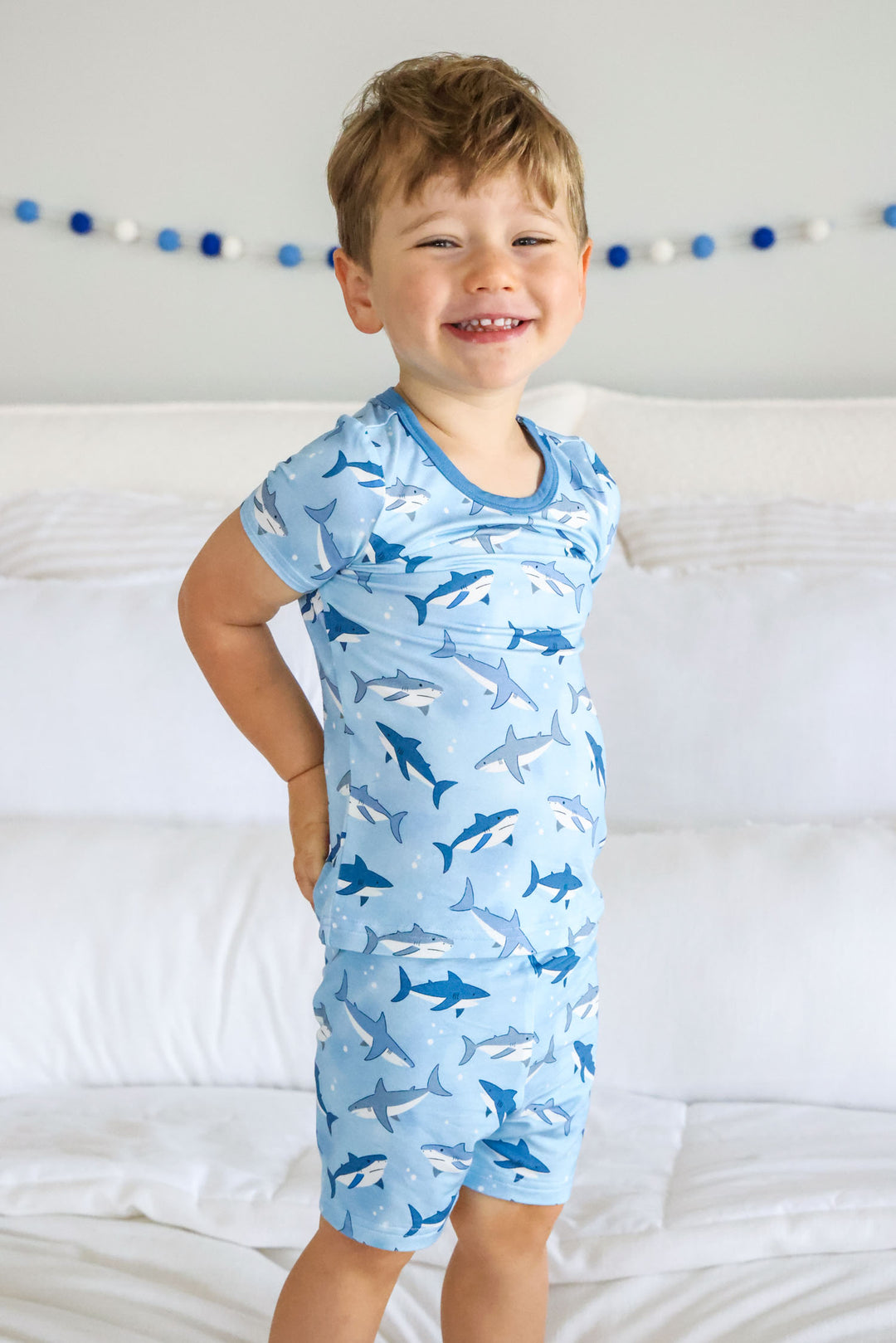 boy wearing fin friends two piece short pajama set