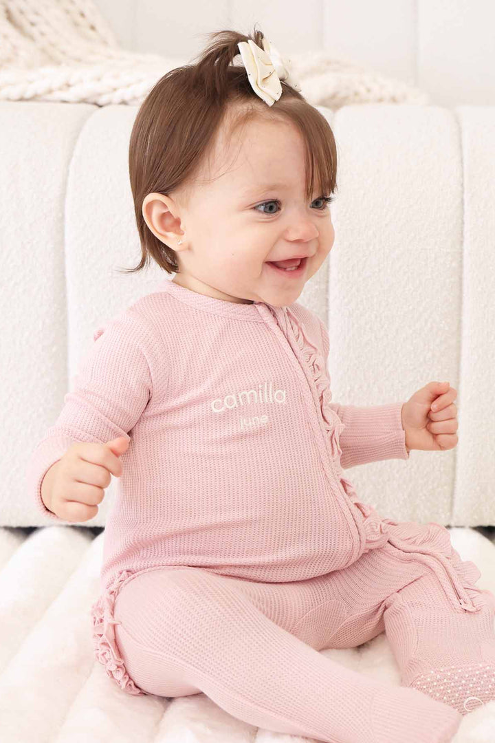 light pink embroidered bamboo waffle zipper footie for girls caden lane 