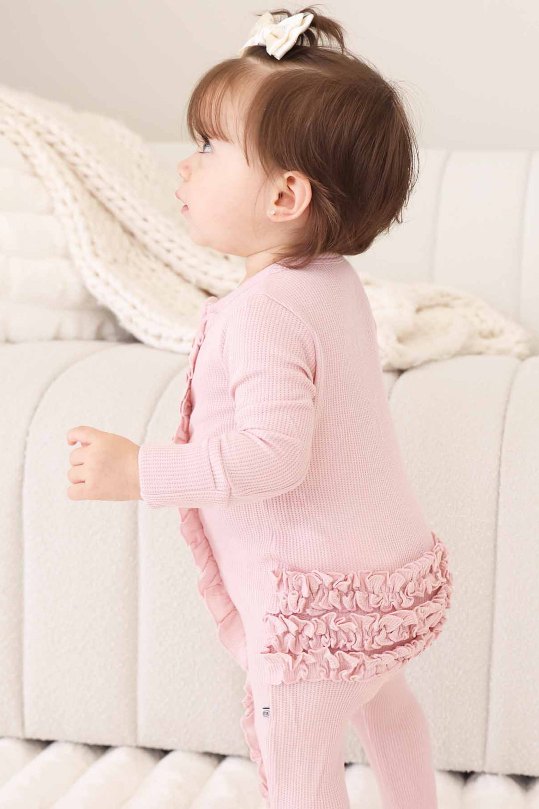 light pink embroidered ruffle bottom zipper footie for baby girls 