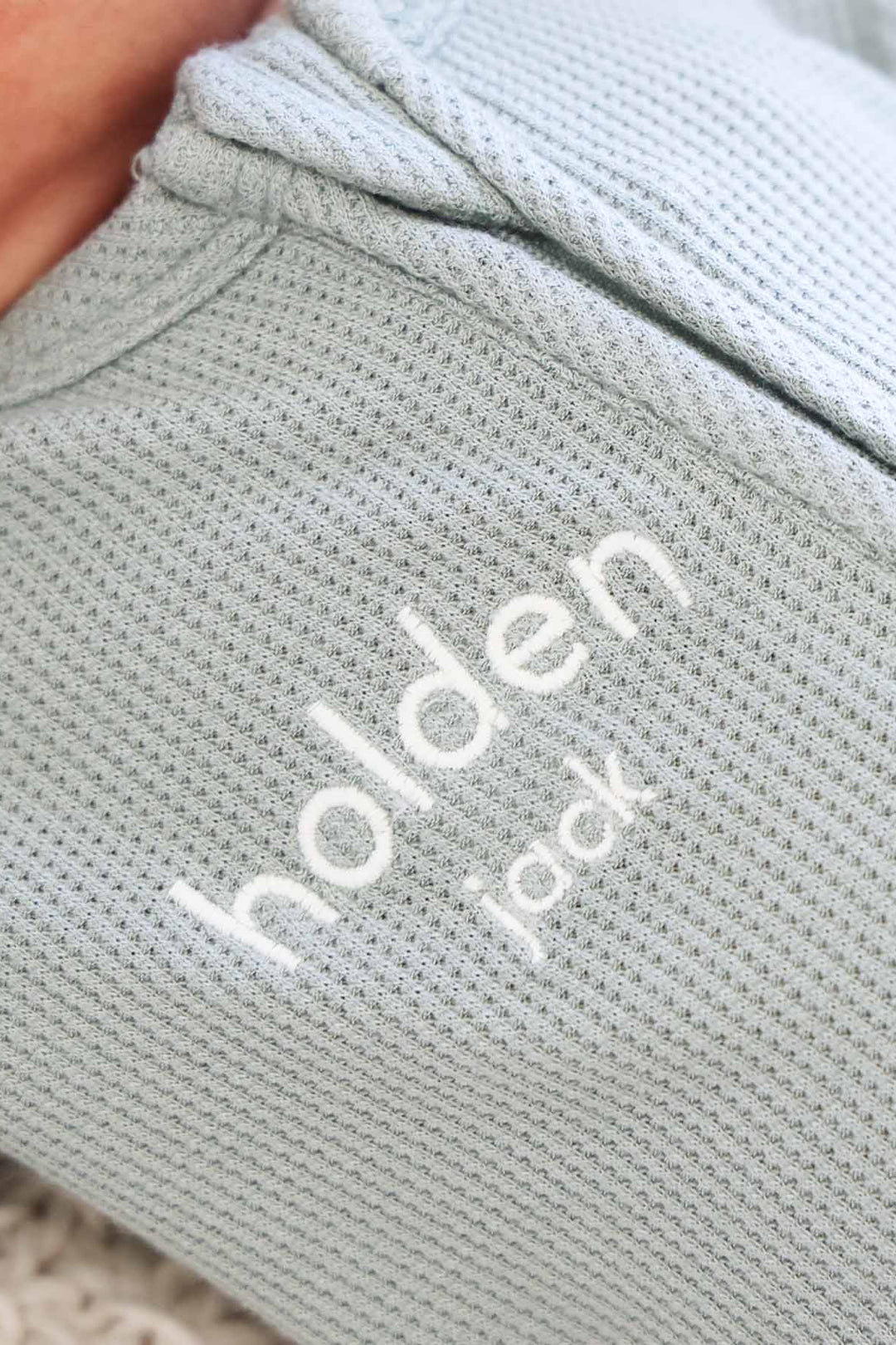 white thread embroidered green bamboo waffle zipper footie 