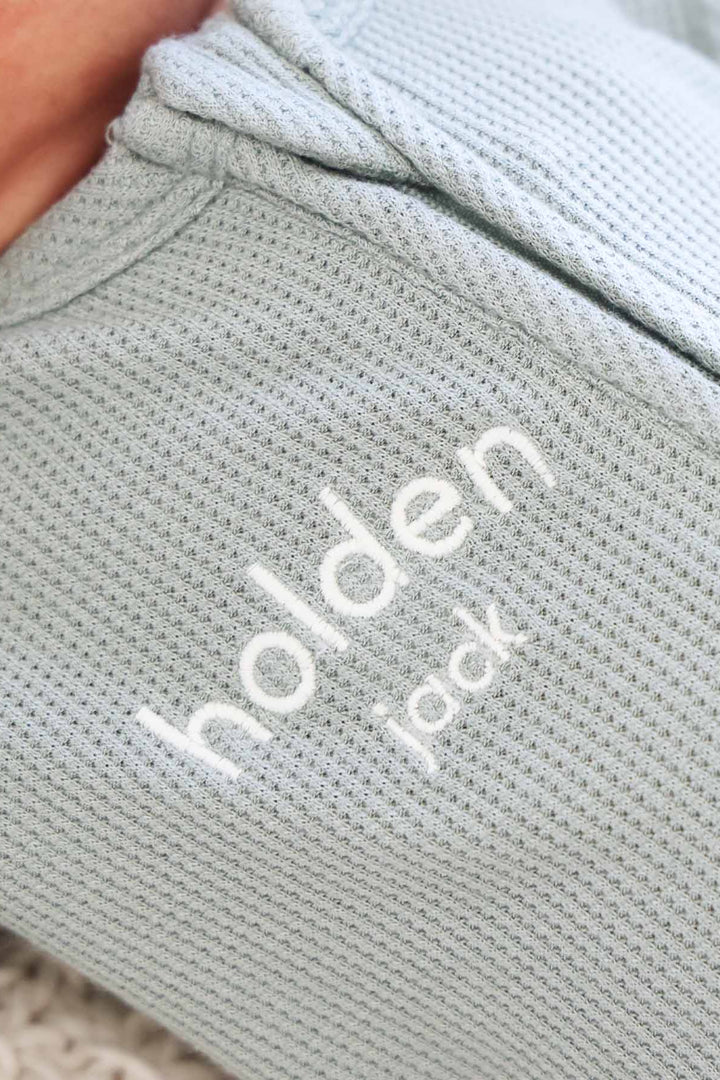 white thread embroidered green bamboo waffle zipper footie 