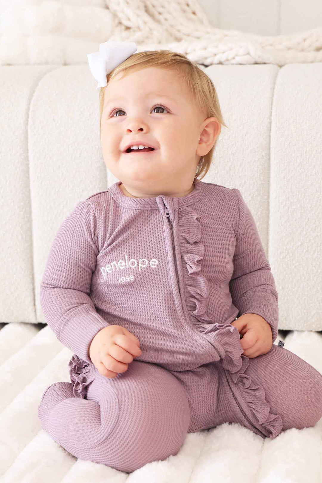 embroidered purple bamboo waffle ruffle footie for girls 