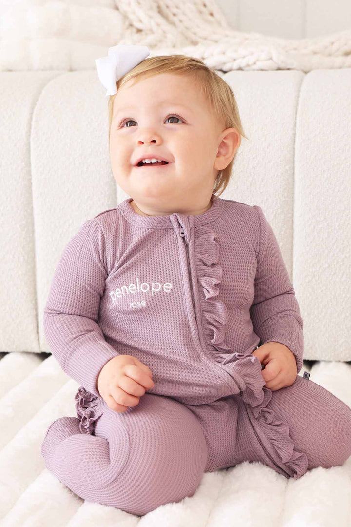 embroidered purple bamboo waffle ruffle footie for girls 