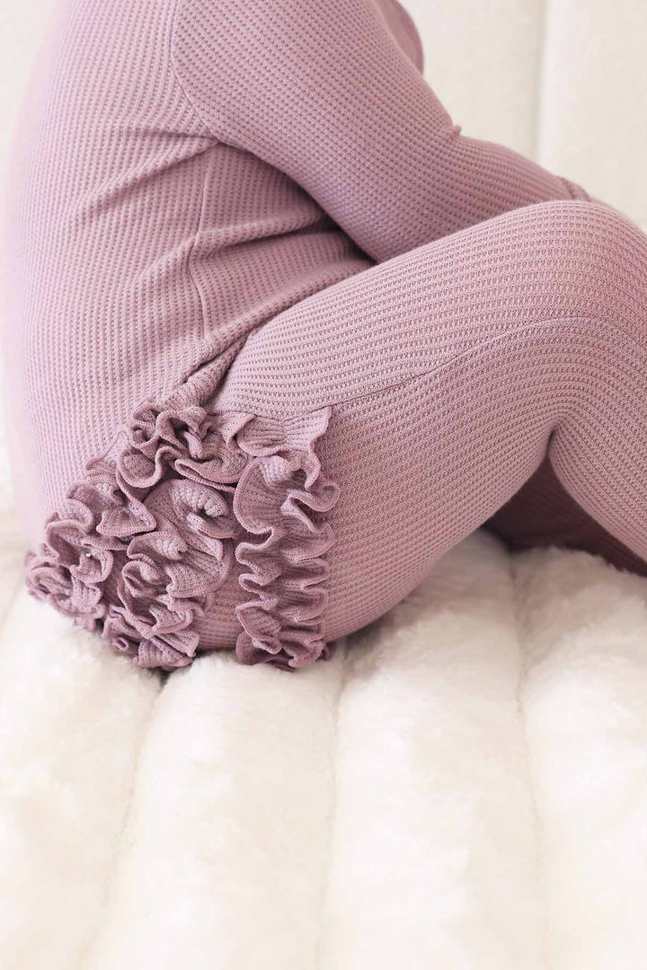 purple ruffle bottom embroidered zipper footie for girls 
