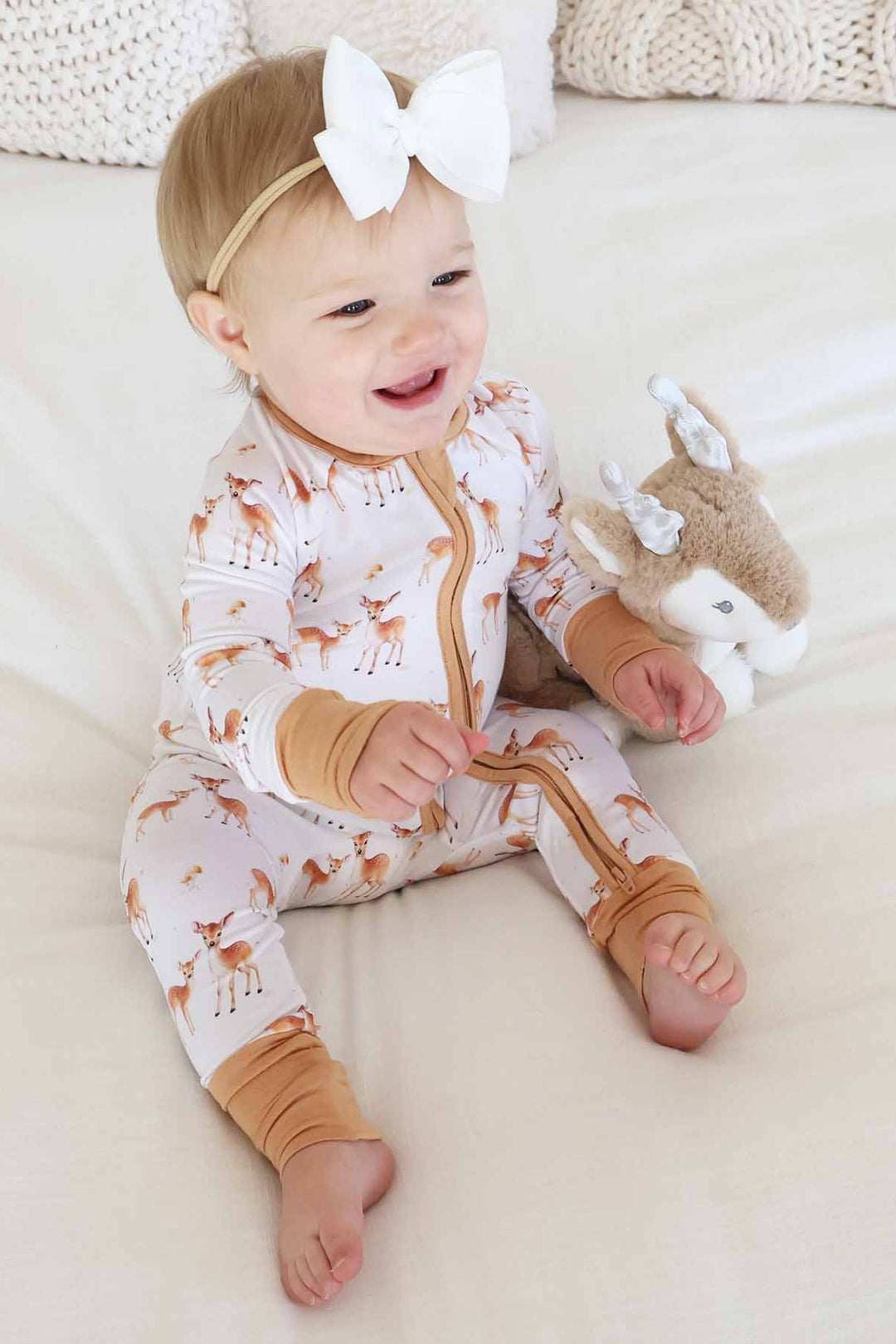 baby girl wearing deer bamboo viscose convertible zip romper 