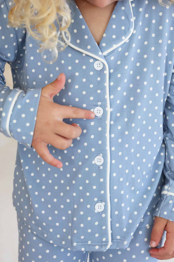close up of girl's lounge set long sleeve with polka dots 