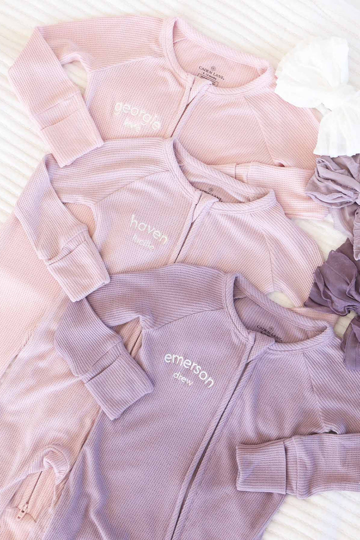 pink and purple bamboo waffle convertible zip rompers for girls 
