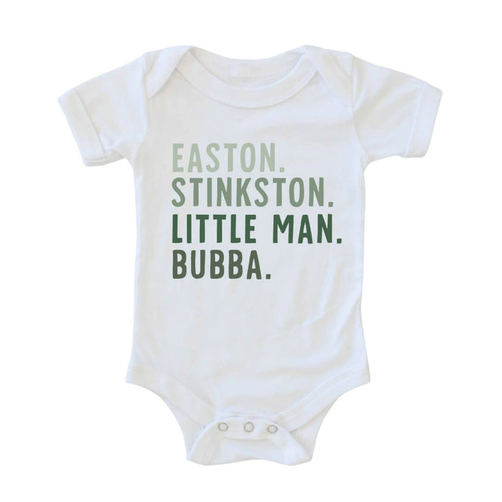 white onesie with nicknames grern letters