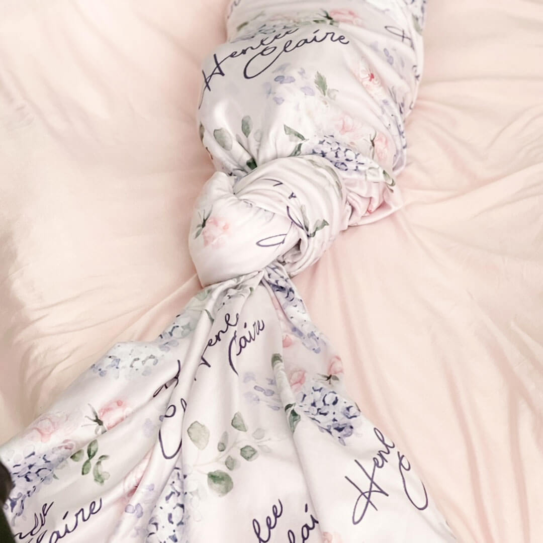 personalized pink and purple hydrangea swaddle blanket for newborns 