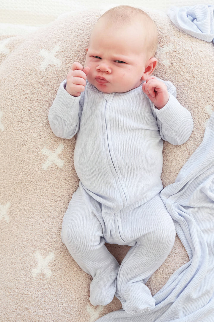 light blue waffle bamboo zipper footie for babies 