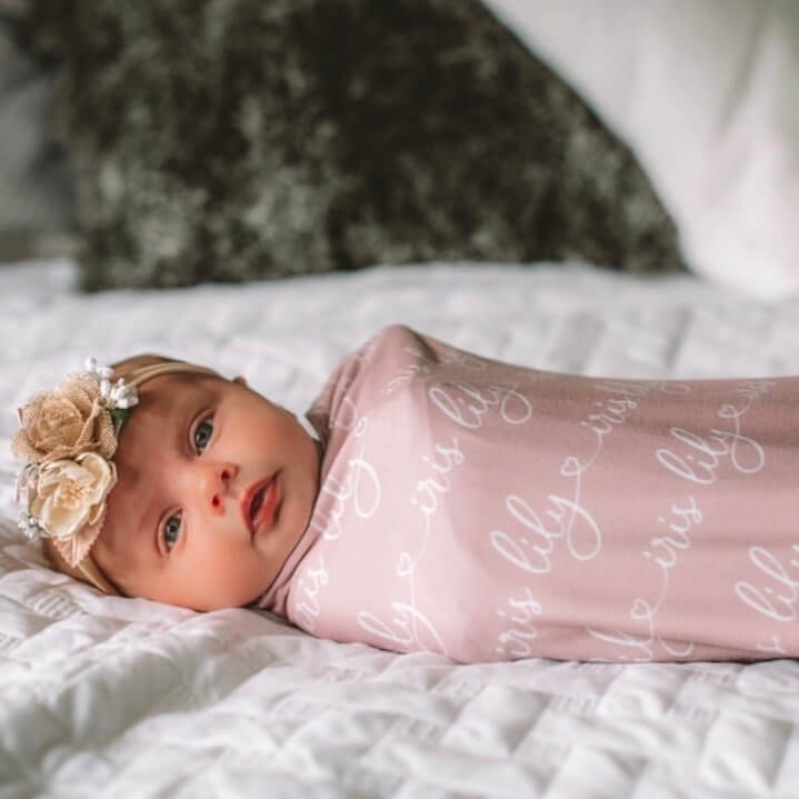 script with hearts mauve swaddle blanket 