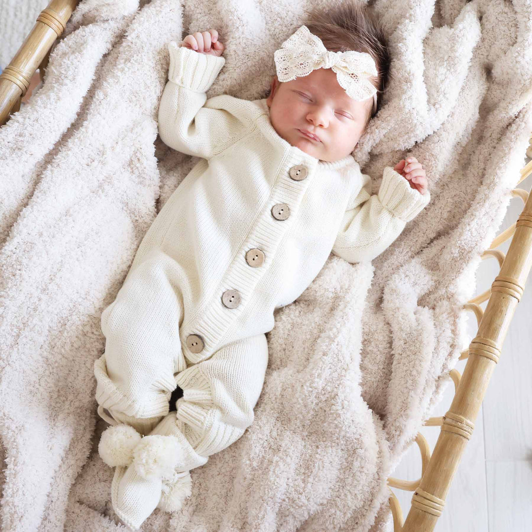 ivory long sleeve sweater romper for babies