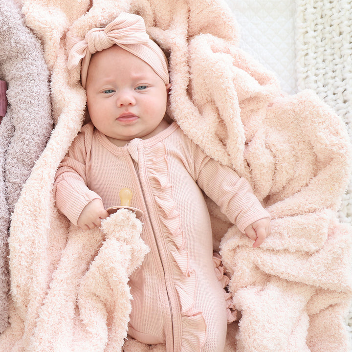 solid light pink cuddlelane plush blanket 