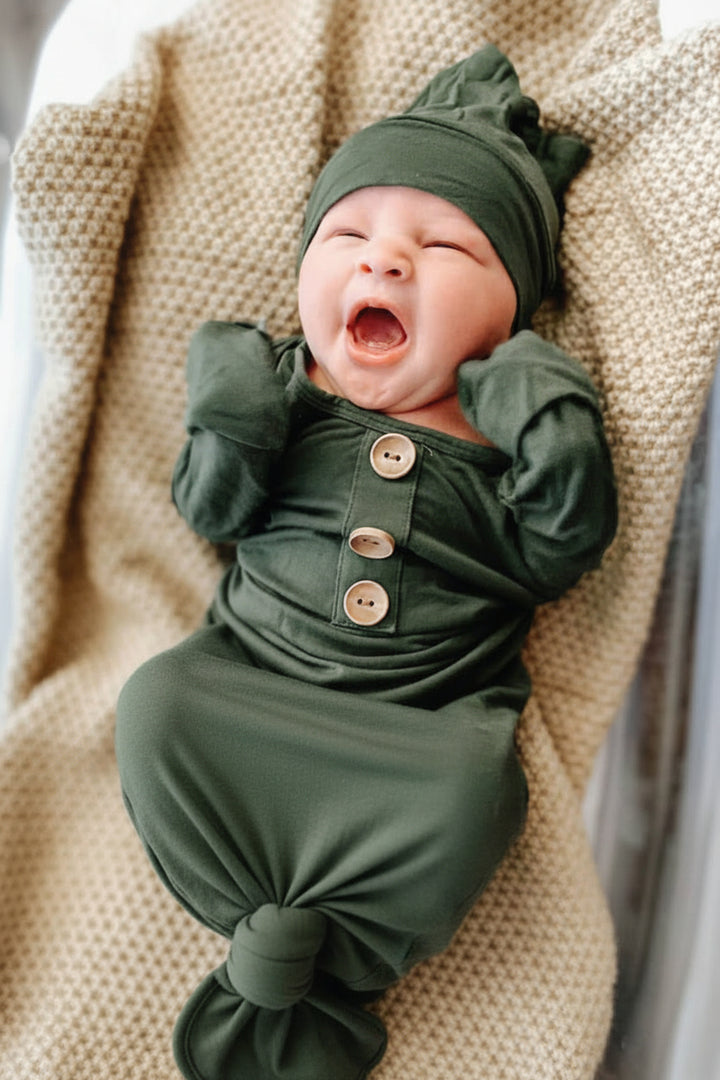 newborn pajamas collection button image overlay