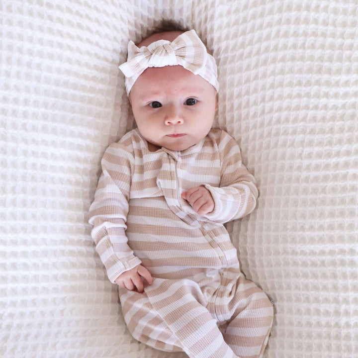 baby wearing the latte stripes headwrap 