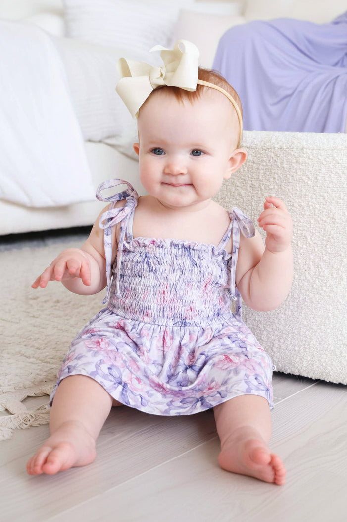 bow spaghetti strap shoulder smocked casual bodysuit for babies leighton's lavender