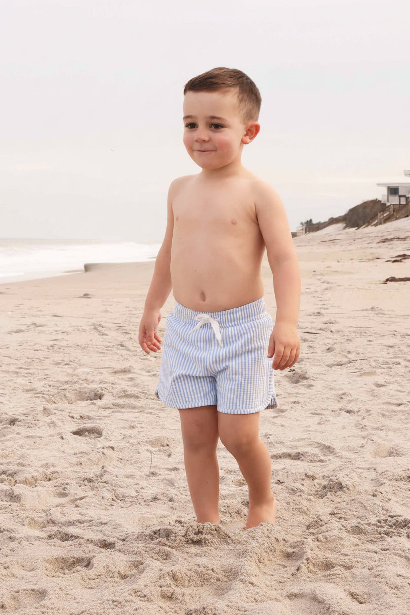 lightweight and comfy boys swim trunks in seersucker blue