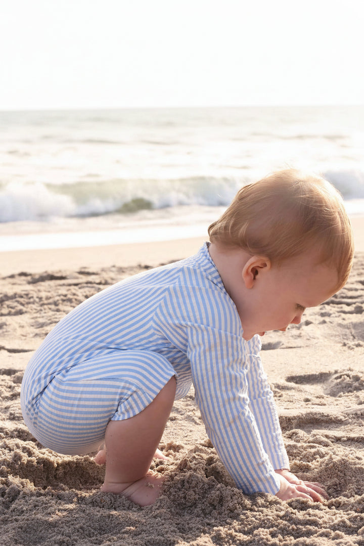 baby and toddler long sleeve rash guard swim romper shortie in seersucker blue