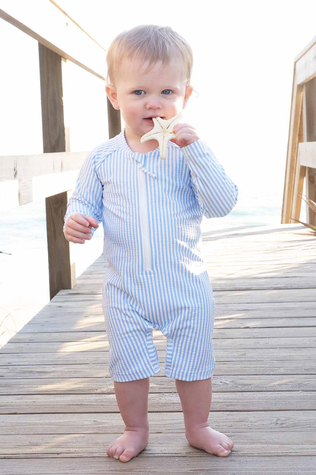 long sleeve rash guard swim romper shortie in seersucker blue for toddlers