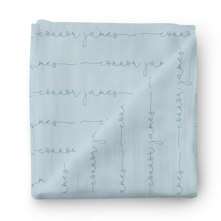 light dusty blue baby name swaddle blanket all script 