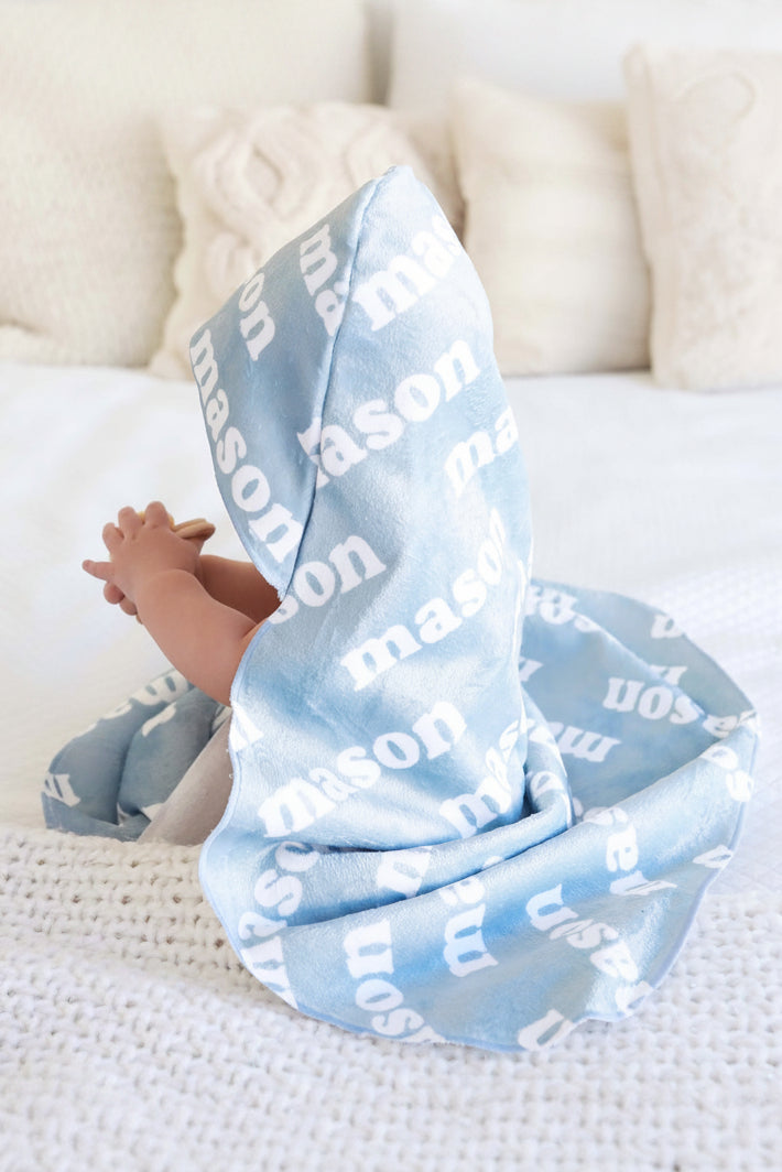 light blue personalized hooded baby name towel 