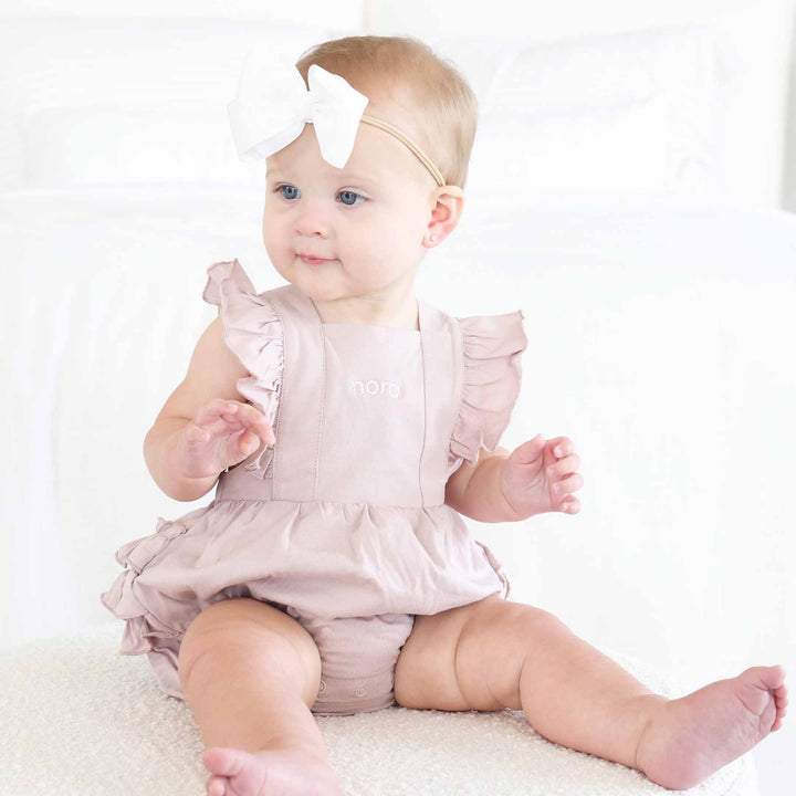 lilac embroidered name romper for girls with ruffles 