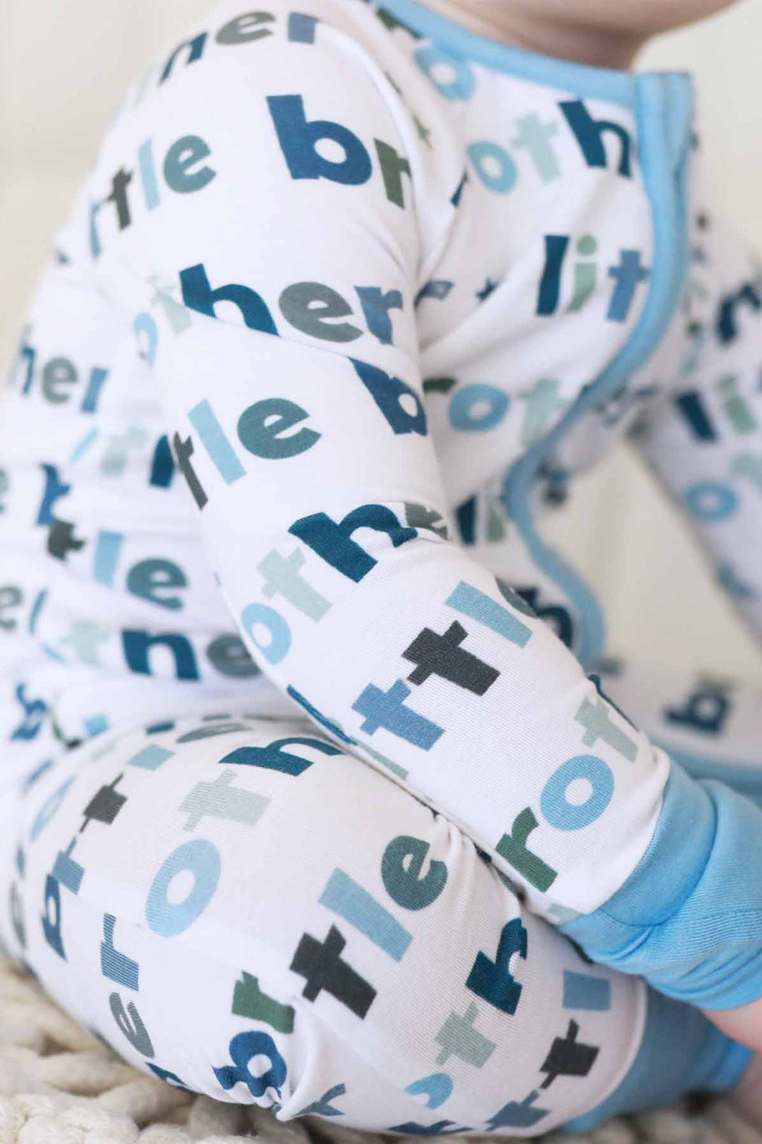 little brother zip romper detail