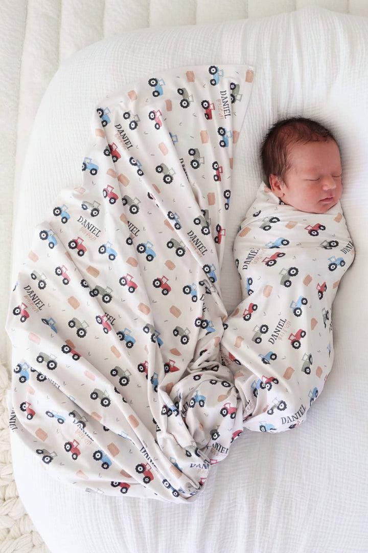 colorful tractor personalized swaddle blanket for babies 