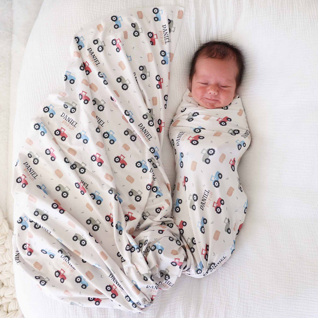 colorful tractor and hay personalized newborn swaddle blanket for boys 