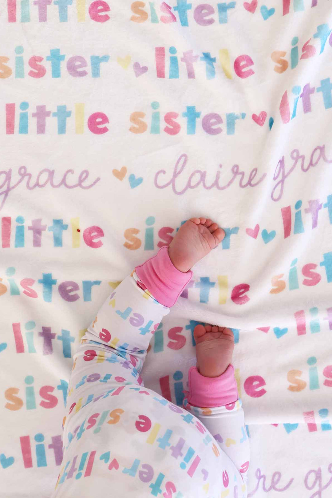 Little girl crawling matching the Little sister personalized balnket 