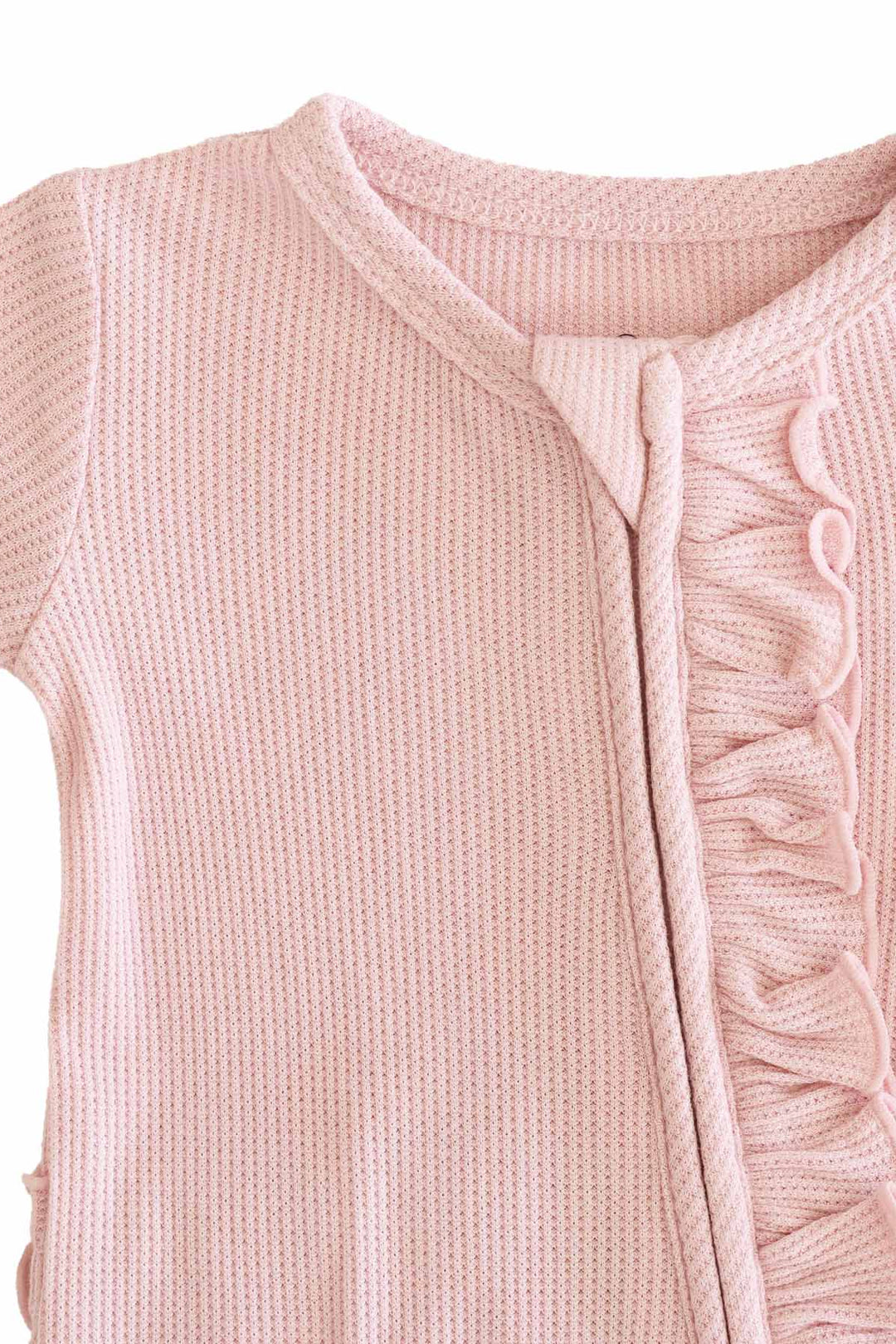 light pink lotus newborn zipper footie with ruffles 