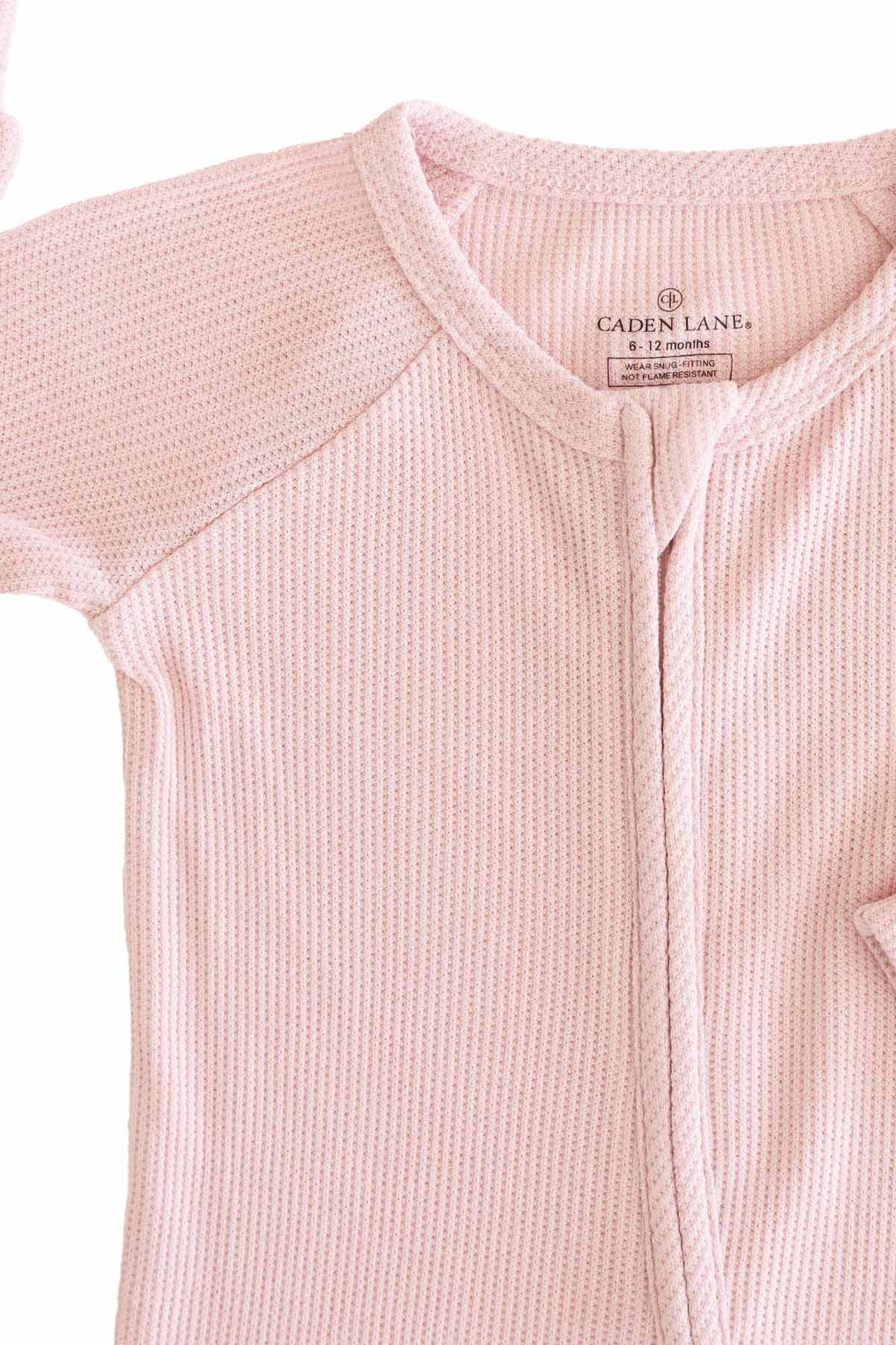 light pink zip romper pajama for babies and toddlers caden lane 