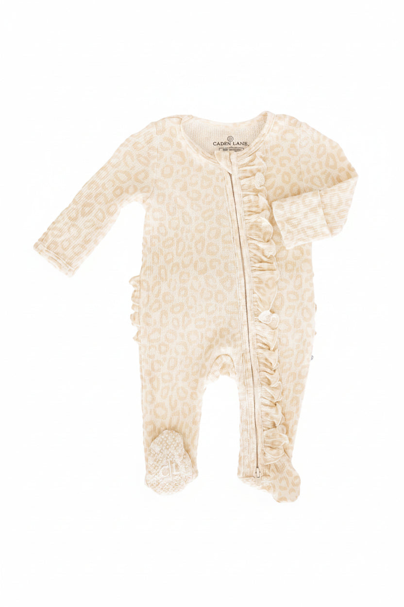 baby ruffle zipper footie with a neutral leopard print 
