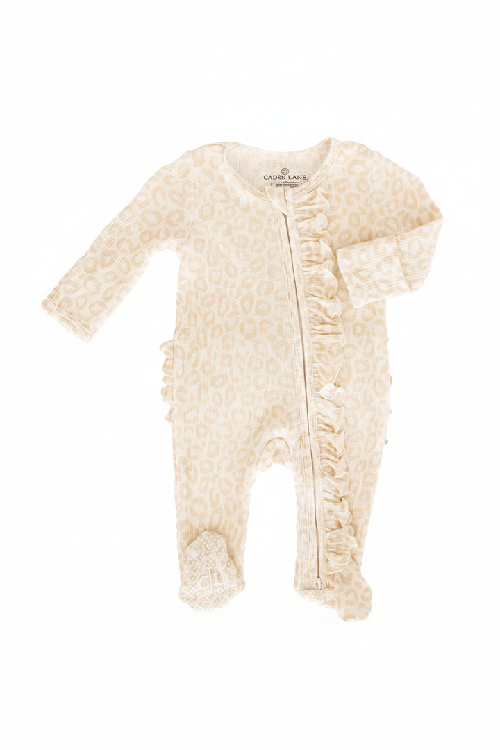 baby ruffle zipper footie with a neutral leopard print 